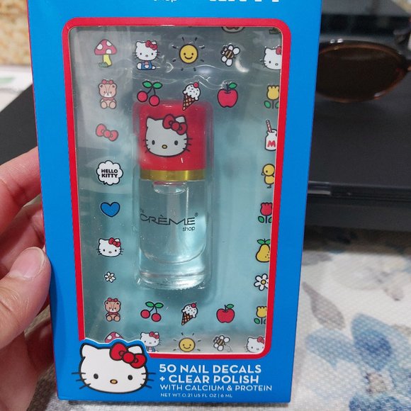 The Creme Shop Hello Kitty Nail Decal with Polish Kit 50 Decals Clear Polish - Picture 1 of 3